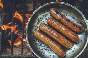 Cooking sausages are a part of campfire cooking 101