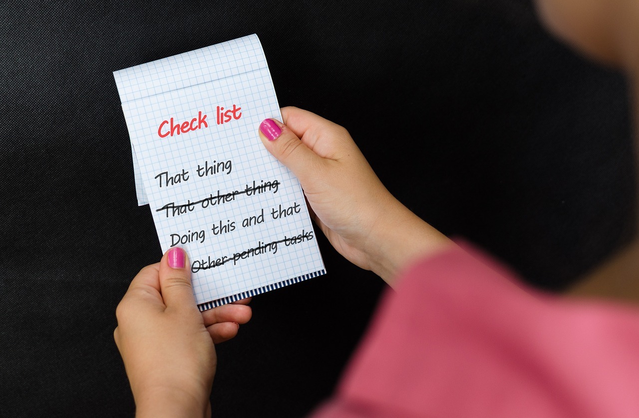 Woman Holding Checklist