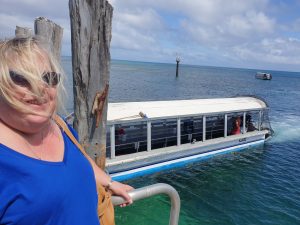 Nicole Anderson with glass bottom boat at Green Island